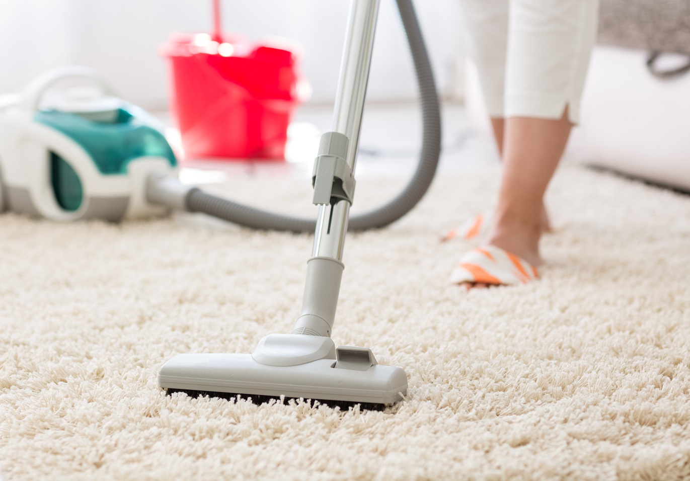 Suction grey carpet cleaning with vacuum cleaner